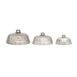 A graduated set of three William IV old Sheffield silver plate meat domes, circa 1830