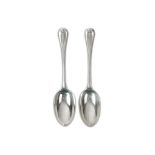 A pair of Victorian sterling silver table spoons, London 1866 marked for Hunt & Roskell overstriking