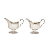 A pair of George V sterling silver sauceboats, London 1926 by Sebastian Garrard