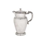 A 20th century Greek sterling silver jug, stamped 925 and ПA in a shield and г42