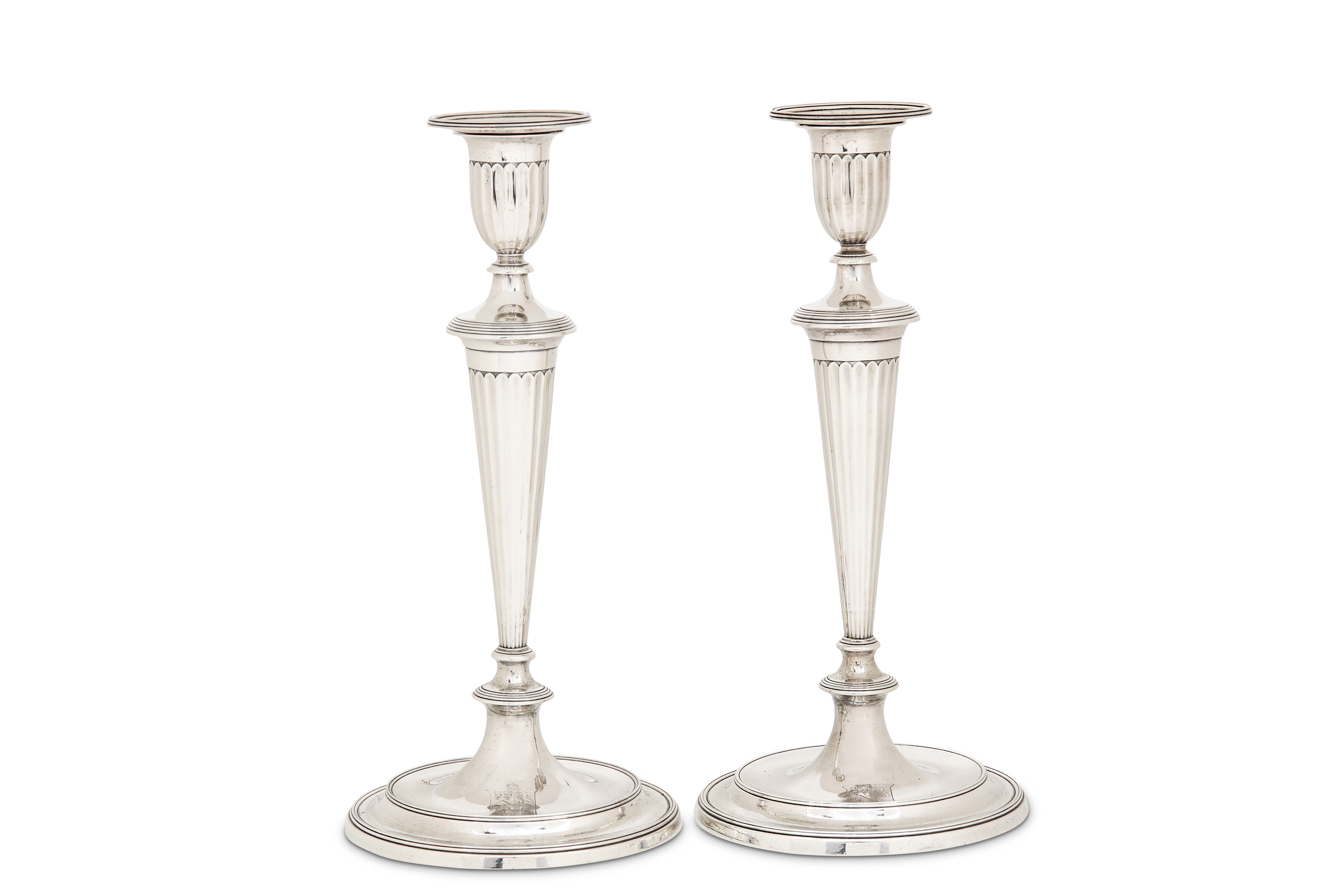 A pair of George III sterling silver candlesticks, London 1794 by John Scofield (reg. 13th Jan 1778)