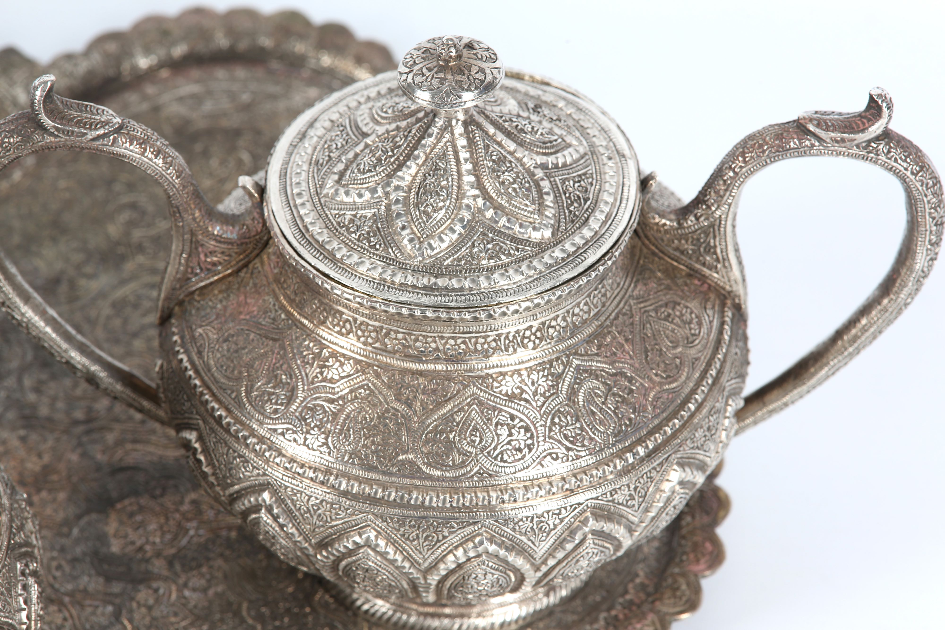 A KASHMIRI WHITE METAL TEA SET - Image 4 of 9