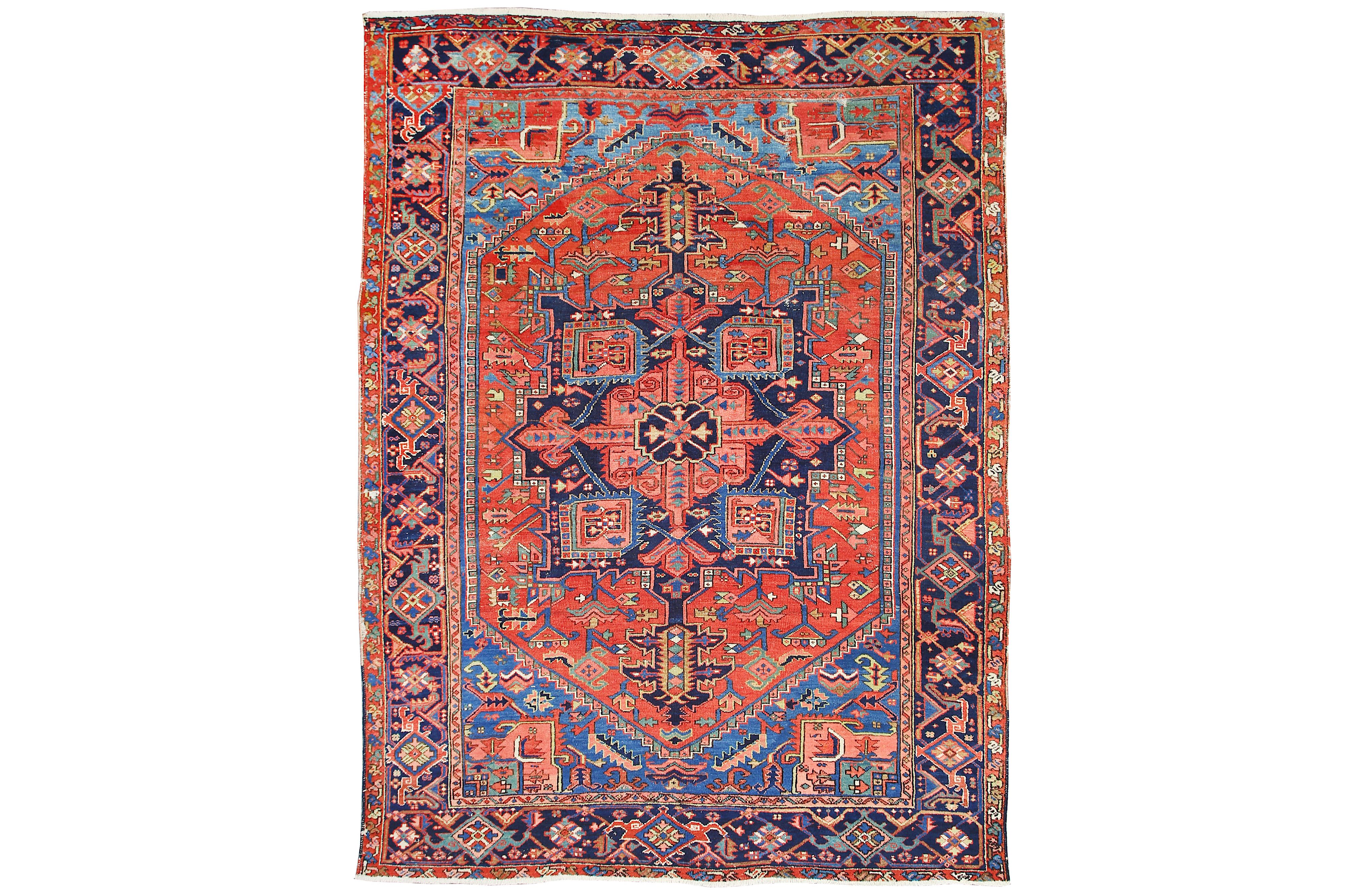 AN ANTIQUE HERIZ CARPET, NORTH-WEST PERSIA