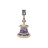 AN OTTOMAN-STYLE BLUE AND WHITE POTTERY CANDLESTICK