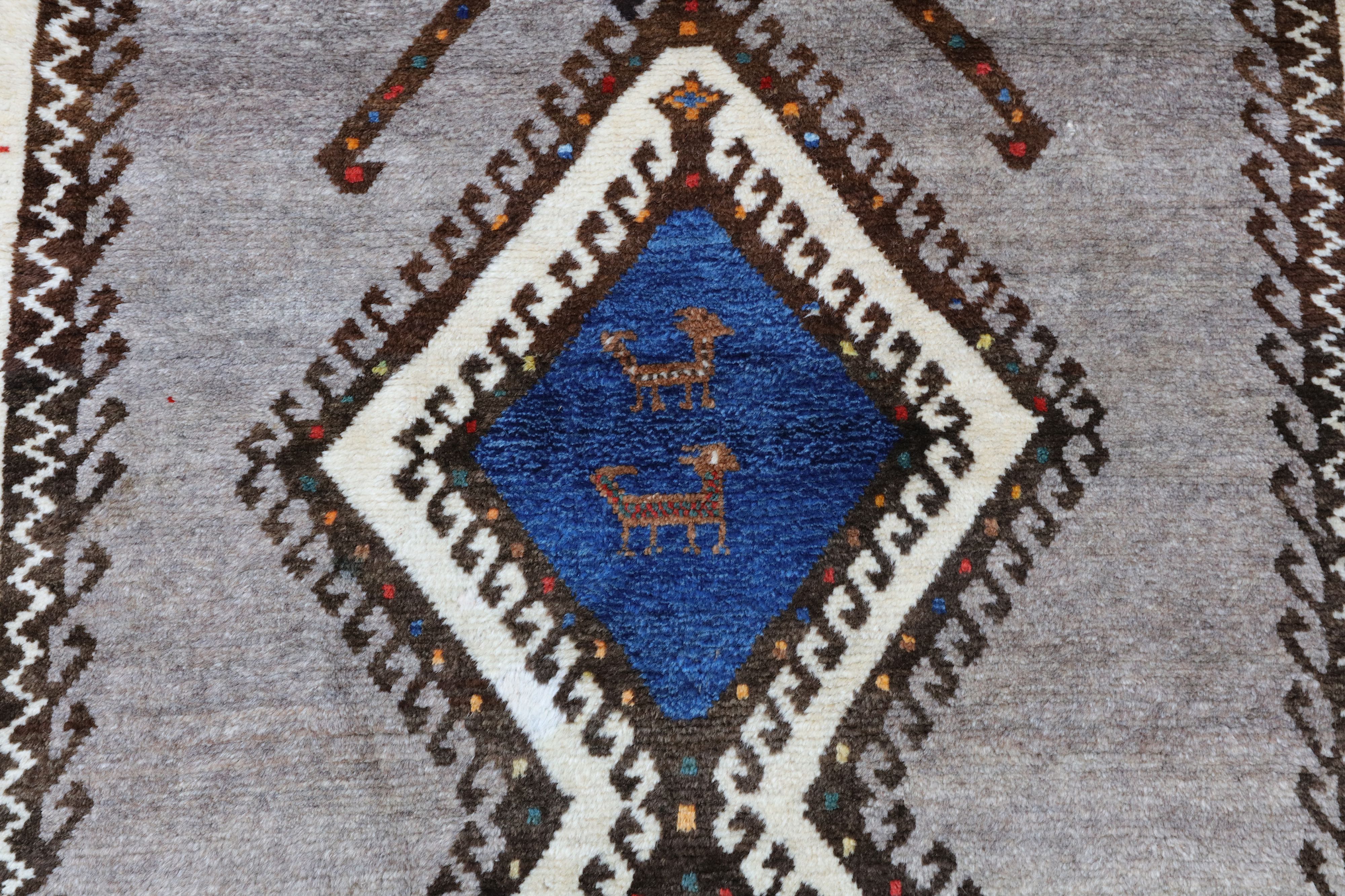 AN ANTIQUE GABBEH LONG RUG, SOUTH-WEST PERSIA - Image 2 of 11