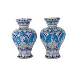 A NEAR PAIR OF MULTAN TURQUOISE AND BLUE POTTERY VASES