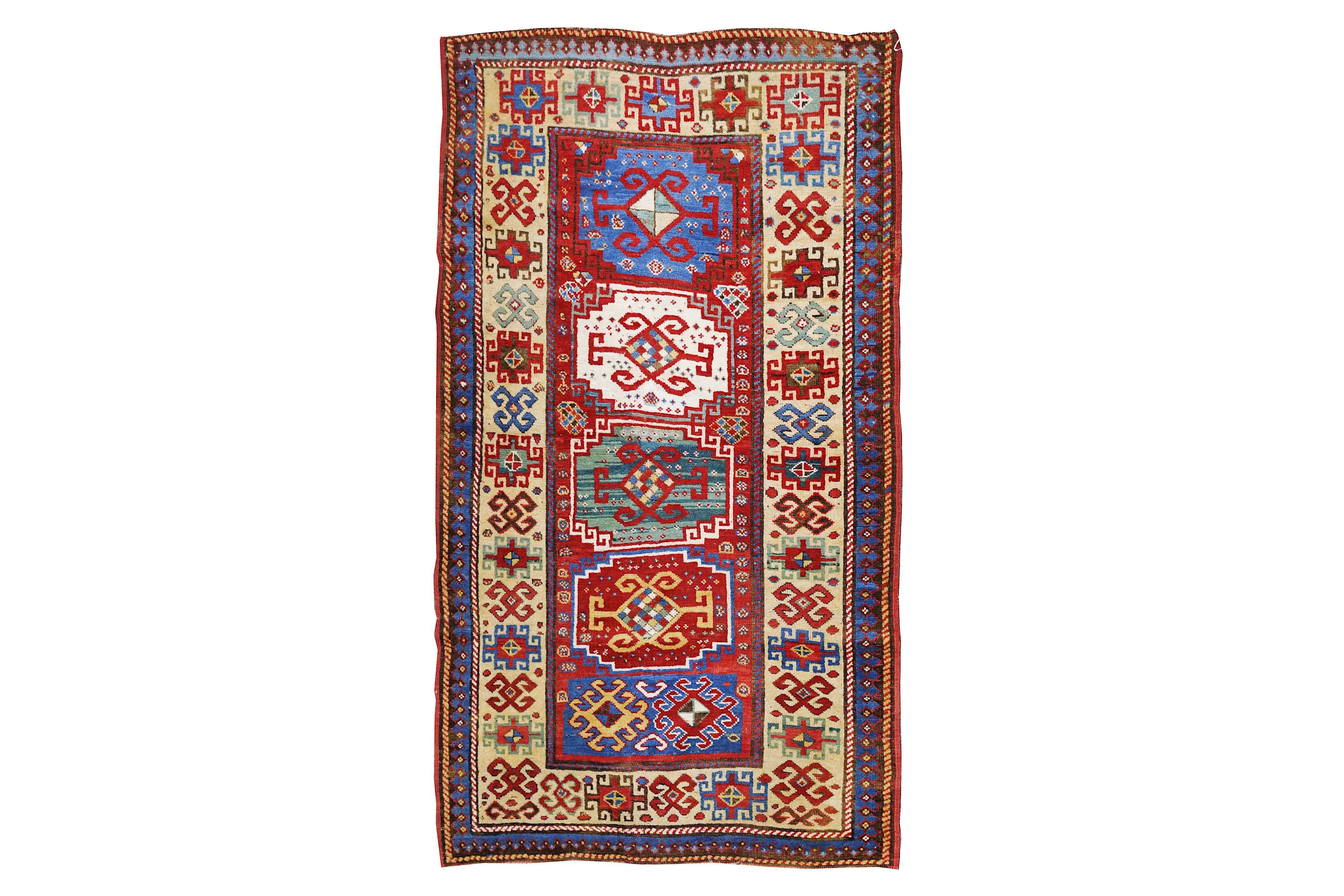 AN ANTIQUE KAZAK RUG, SOUTH CAUCASUS