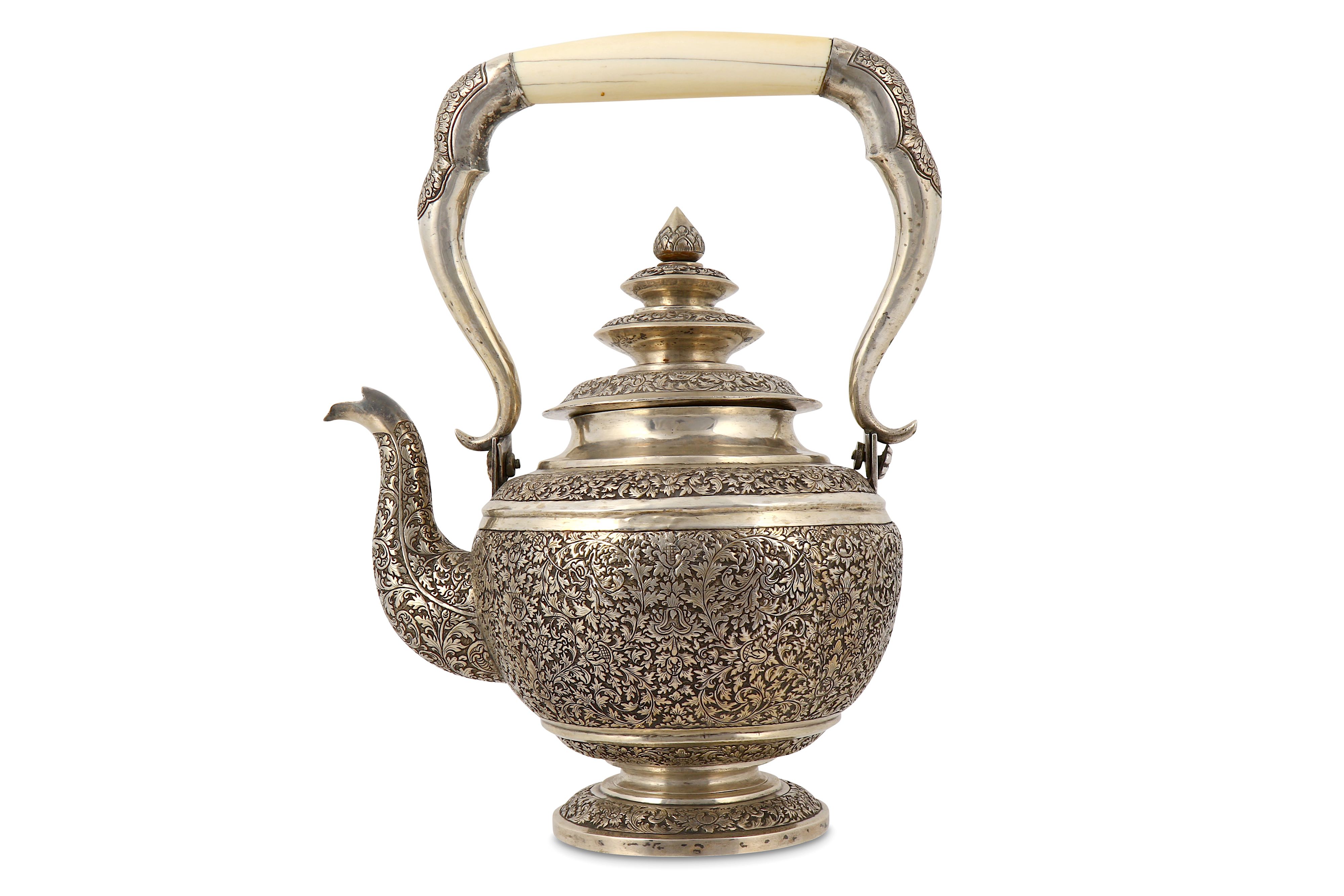 AN ENGRAVED SILVER THAI KETTLE (KAR NAM TON)