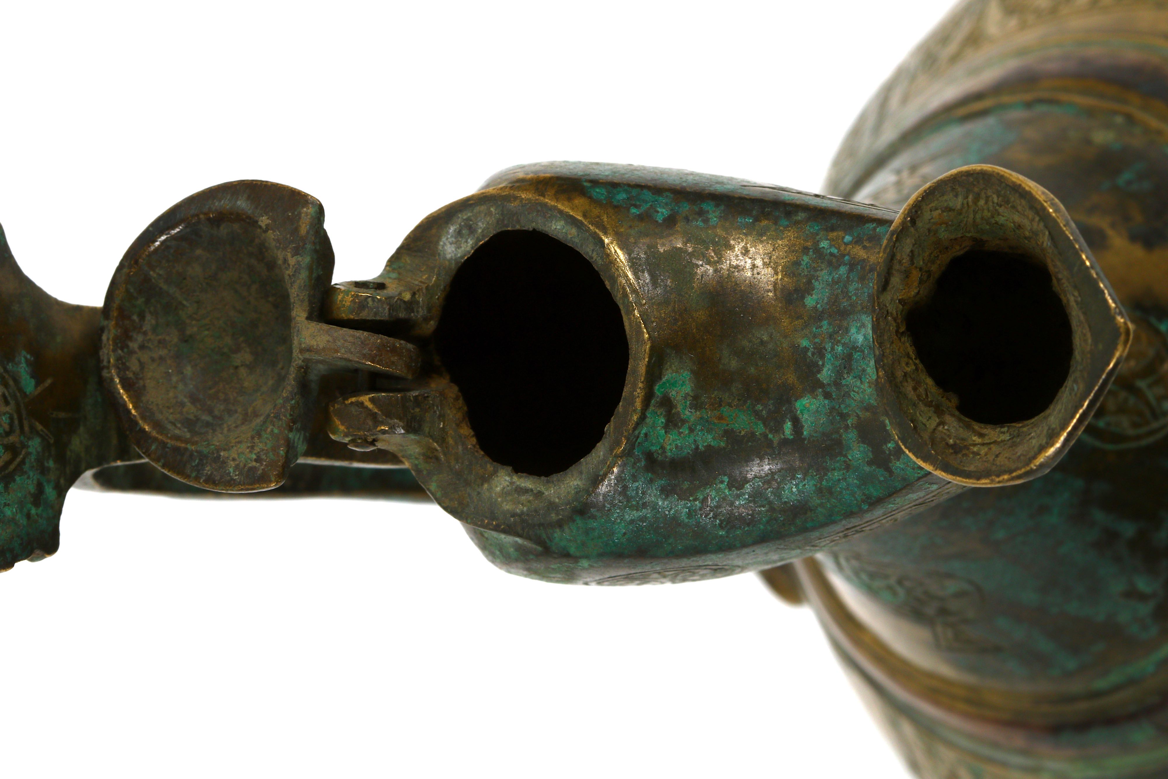 A KHORASSANI BRASS EWER - Image 8 of 8