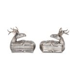 A PAIR OF REPOUSSÉ DEER-SHAPED SILVER BOXES