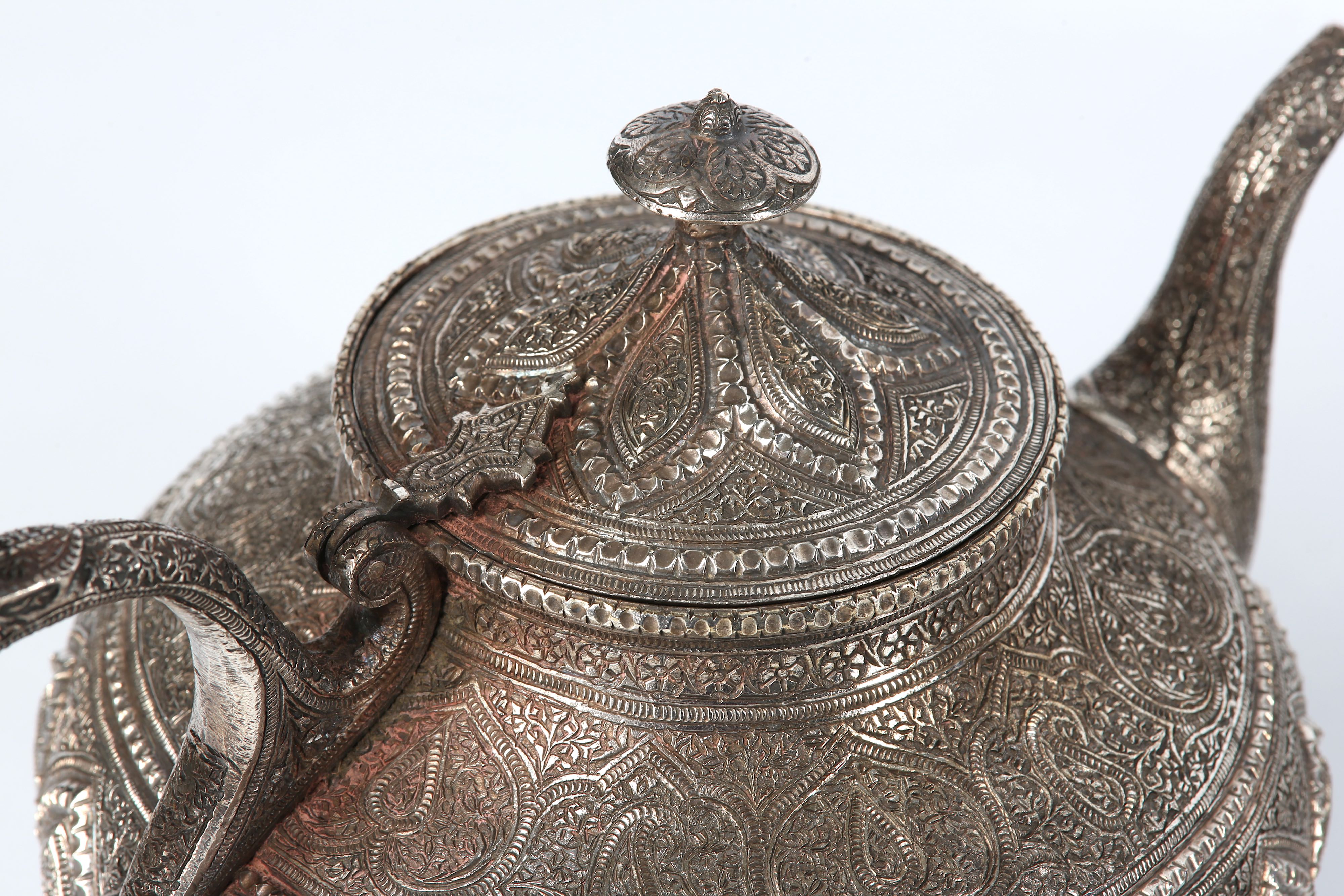 A KASHMIRI WHITE METAL TEA SET - Image 7 of 9