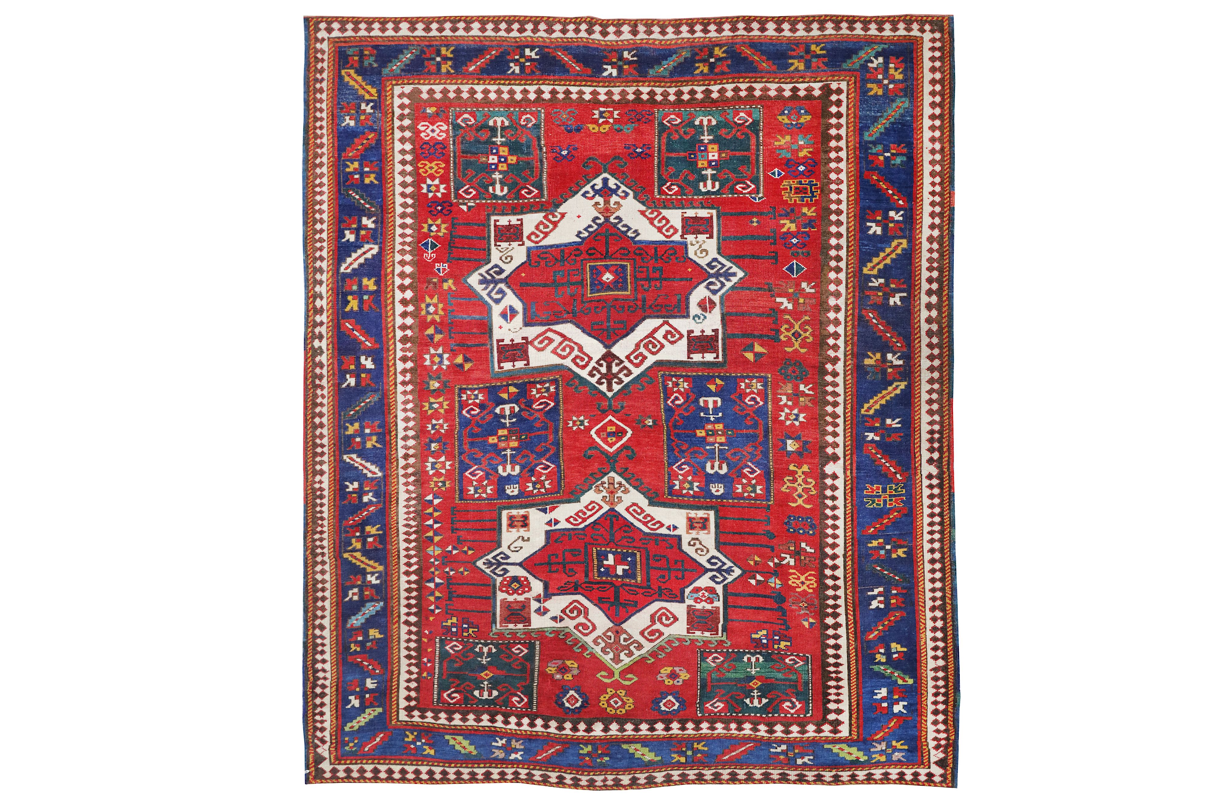 AN ANTIQUE FACHRALO KAZAK RUG, SOUTH CAUCASUS