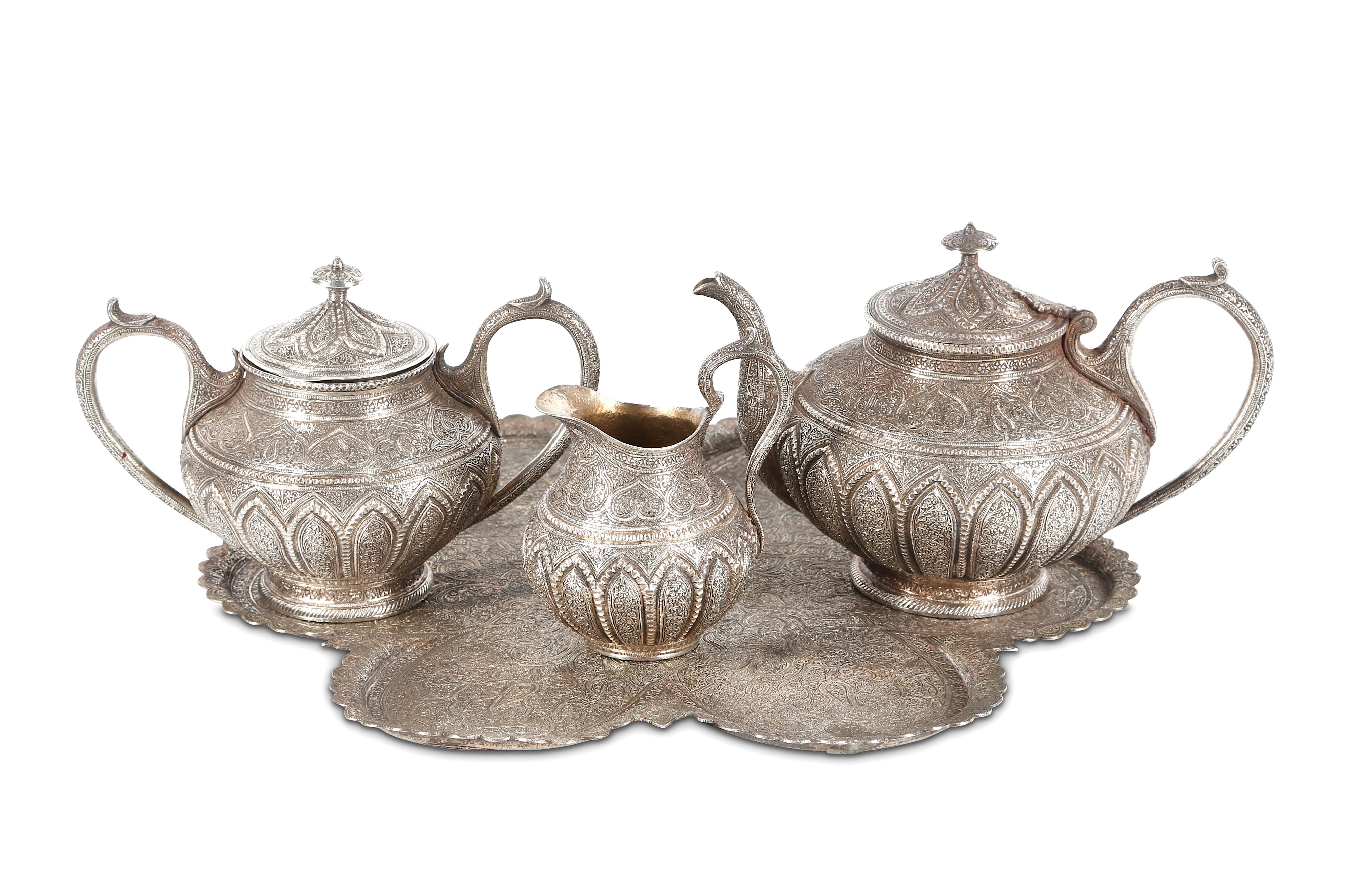 A KASHMIRI WHITE METAL TEA SET