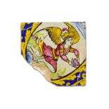 A CUERDA SECA FIGURAL POTTERY TILE WITH WINGED ANGEL