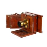A Whole Plate Mahogany Studio Camera with Anachromatic Brass Lens