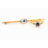 A sapphire and diamond cluster ring and a sapphire and diamond bar brooch