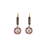 A pair of ruby and diamond earrings