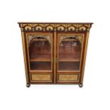 An unusual late 19th Century mahogany gilt decorated and carved display cabinet