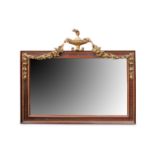 A Victorian wall mirror, with a fluted walnut and parcel gilt frame