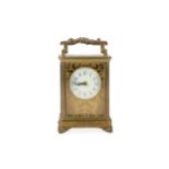 A late 19th / early 20th century gilt brass carriage clock