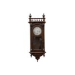 A late 19th to early 20th Century walnut Vienna regulator style clock