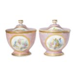 A pair of 18th to early 19th Century Sevres style Paris Porcelain chocolate cups and covers,