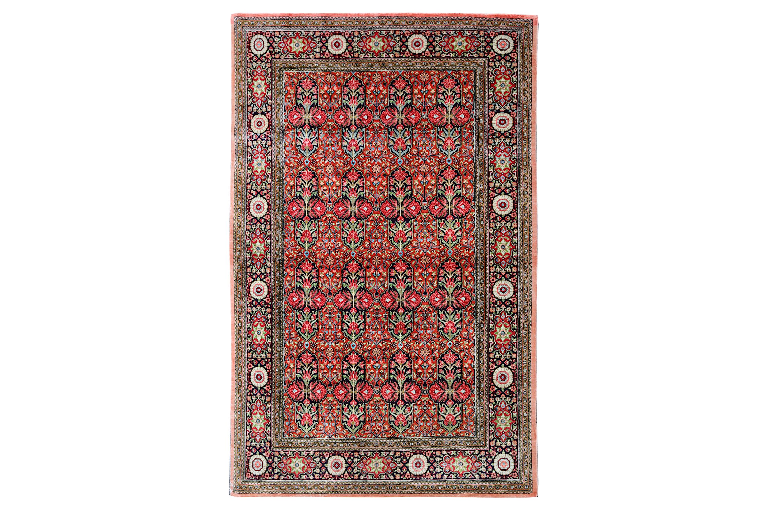 AN EXTREMELY FINE SILK QUM RUG, CENTRAL PERSIA