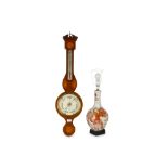 An Edwardian mahogany banjo barometer