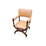 A late Victorian walnut open armchair