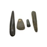 FOUR HIGHLANDS STONE AXE HEADS, PAPUA NEW GUINEA