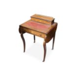 An Edwardian rosewood writing table