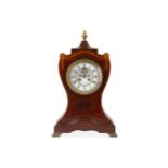 A late 19th / early 20th century Regency style mahogany mantel clock