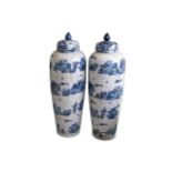 A pair of large Chinese blue and white porcelain jars and covers.