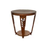 A circular Art Deco style walnut occasional table