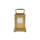 A late 19th / early 20th century French gilt brass miniature carriage clock signed 'Tiffany London'