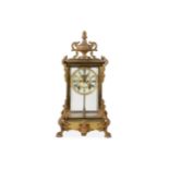 A late 19th / early 20th century American gilt bronze four glass mantel clock by the Ansonia Clock C