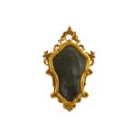 An early 20th Century gilt cartouche form mirror in the Baroque style