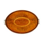 A George III mahogany and marquetry inlaid twin handled oval tray,