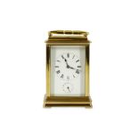 A 20th century brass cased repeating carriage clock with alarm
