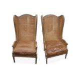 A pair of French design Deauville limed oak double caned wing back armchairs
