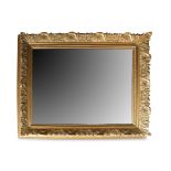 A large giltwood rectangular wall mirror