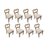 A harlequin set of eight dining chairs