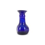 A HOT-WORKED COBALT BLUE GLASS VASE