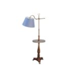 A 19th century style floor standing mahogany rise and fall lamp