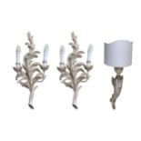 A pair of Italian Chelini carved and painted twin branch wall sconces