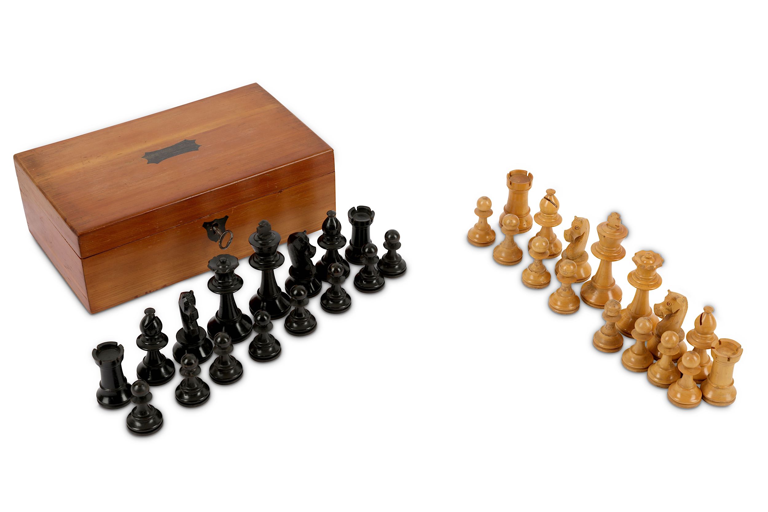 An early 20th Century ebony and boxwood complete Staunton pattern chess set