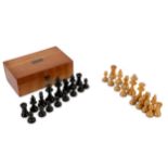 An early 20th Century ebony and boxwood complete Staunton pattern chess set