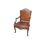 A George III style mahogany open arm chair