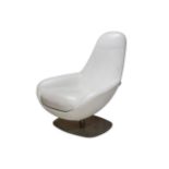 A Habitat white leather swivel chair.