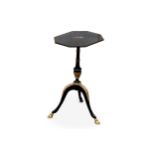 An antique Regency style black lacquered occasional table